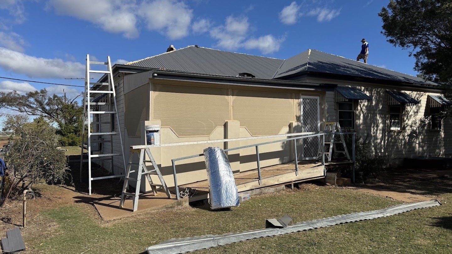 A house mid re-roof with scaffolding up and new steel going on